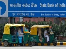 Carlyle to buy 26% in State Bank of India's credit card ventures