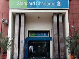 How was StanChart PE's partial exit from Redington?