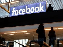 Undeterred by Facebook news blackout, Australia commits to content law
