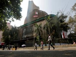 Sensex closes flat; IT, pharma gain