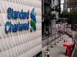 StanChart reaches provisional pact to sell real estate unit to Actis