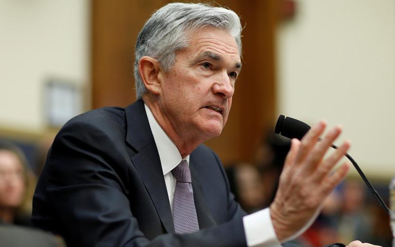 US Fed raises interest rates, forecasts more hikes this year
