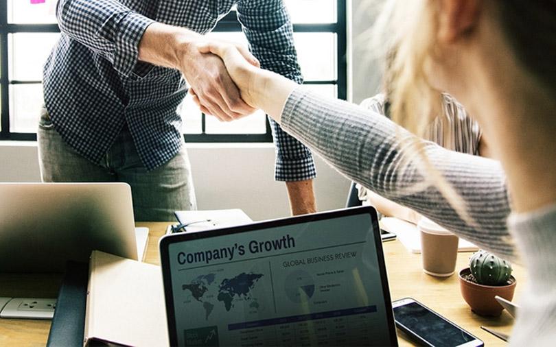 How is KKR’s business advisory venture with Tranzmute different from Capstone?