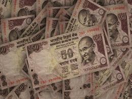 Rupee falls to new life-time low, bonds slump