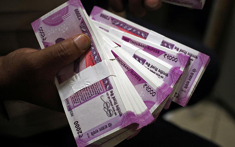 Rupee drops to new low near 74.50 per dollar