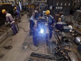 Factory activity growth slows in February on weak demand
