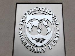 IMF sees trouble in emerging markets but less severe global contraction