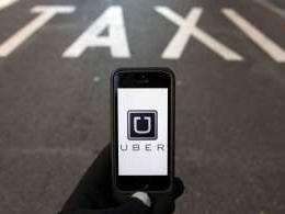 Times Internet in marketing and investment pact with cab hailing app Uber