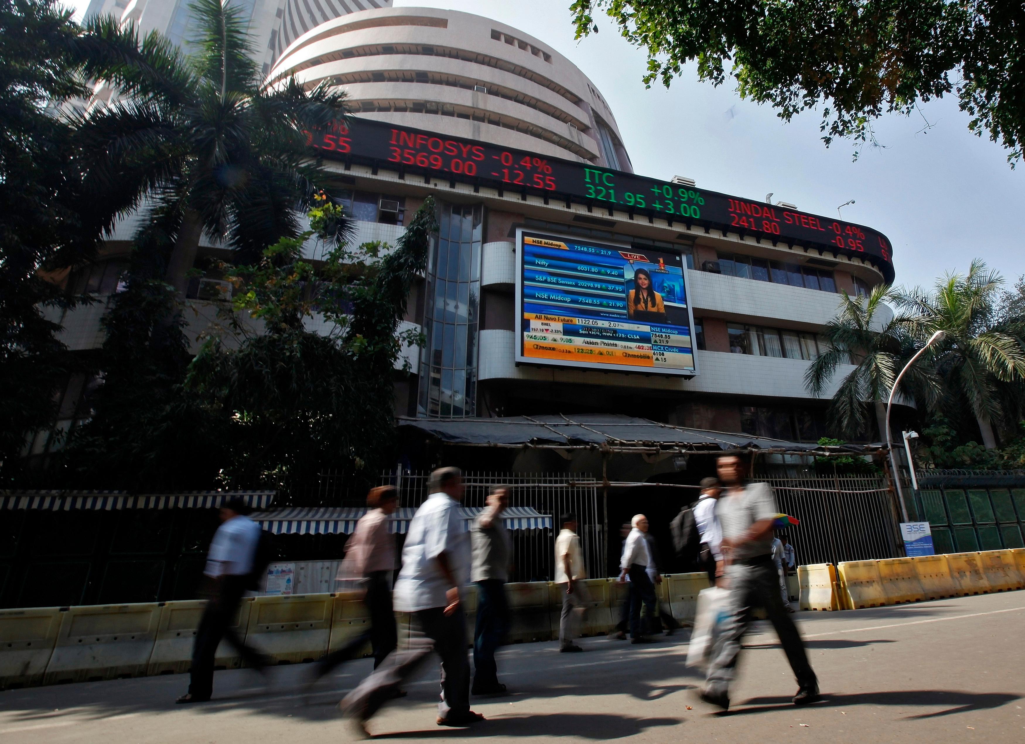 Sensex slides further, Nifty ends below sensitive 8,000 mark