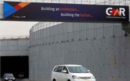 GMR to sell two transmission projects to Adani
