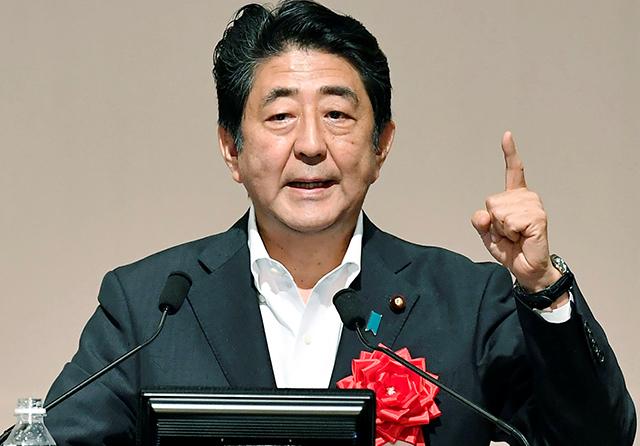 Japan unveils $266 bn economic stimulus package