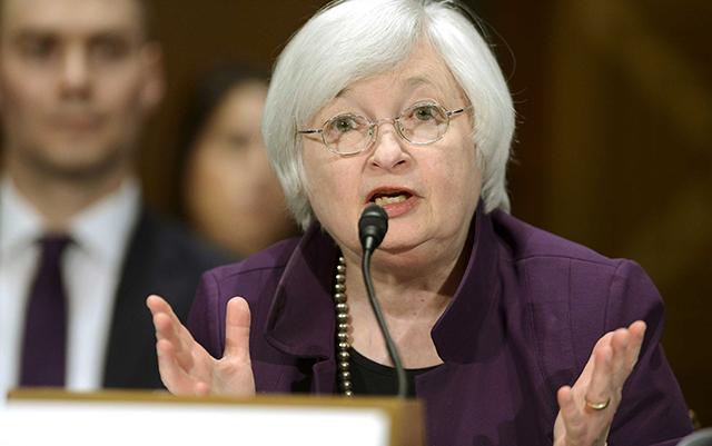 US Fed keeps rates on hold, hints at hike later