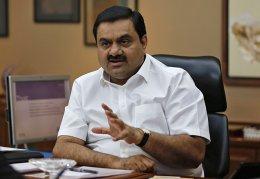 Adani to buy Reliance Infra's power transmission biz