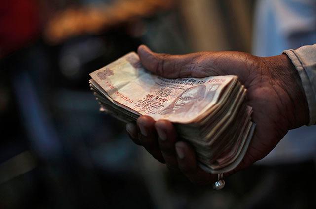 Rupee slumps to nine-month low