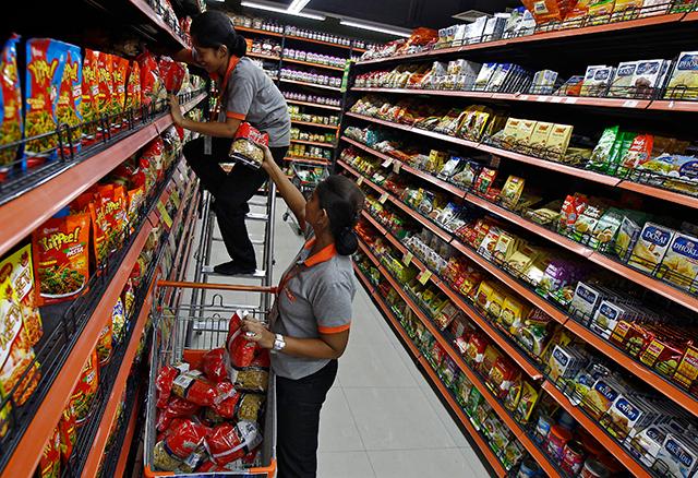 Inflation quickens to five-month high in June; industrial growth slows