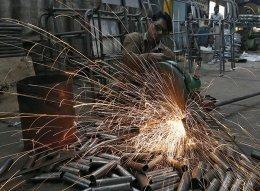 India manufacturing activity expands a tad in February