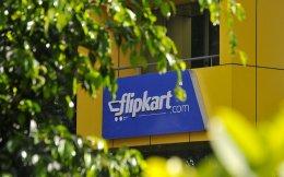 Flipkart raises $1 bn in down round: Report