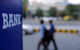 Bank stocks power Sensex to new record on $32 bn recapitalisation plan