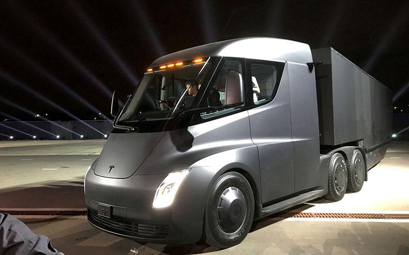 Tesla unveils electric big-rig truck, $200,000 sports car Roadster