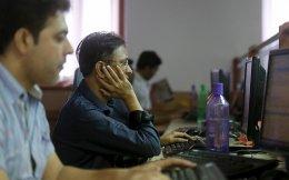 Sensex, Nifty end lower as Infosys crashes