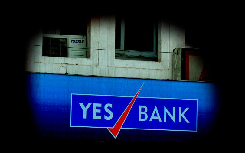 Yes Bank, Tata Motors push Sensex into the red