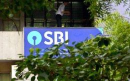 India probes debt trustee units of SBI, Axis, IDBI on suspected fee cartel - Reuters Excl