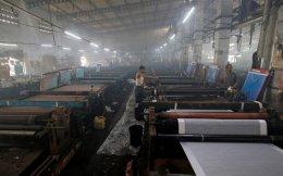 India's October factory growth at decade high but firms cut jobs for seventh month