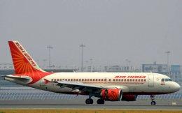 Govt calls for bids to sell entire stake in Air India