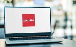 Zomato's net loss nearly halves to ₹186 cr in Q1