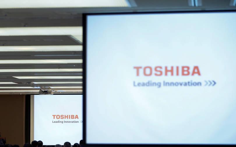 Toshiba plans to split into three firms, rejects calls to go private