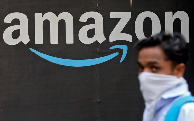 Explainer - Amazon's battle with Reliance for India retail supremacy