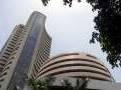 Sensex, Nifty rebound from day's low to hit fresh record high minutes before close