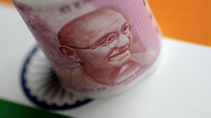Relief from oil prices helps rupee inch up, outlook remains weak