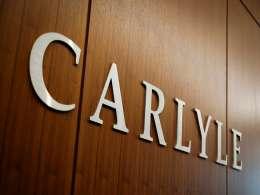 Carlyle quarterly profit rises on private-equity dealmaking